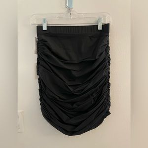 Aritzia high waisted fitted skirt with ribs along side. Size 4.